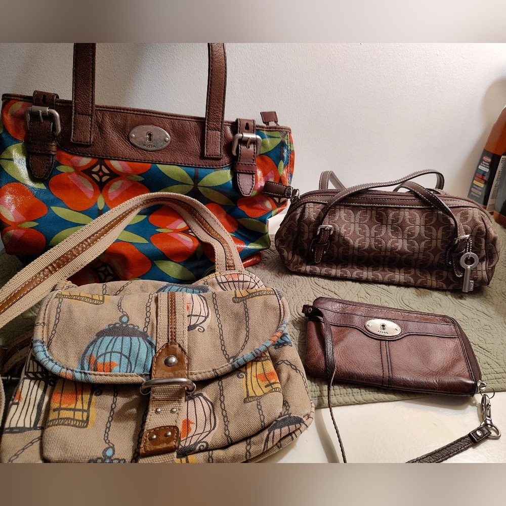 Fossil -lot of three purses and one wristlet.